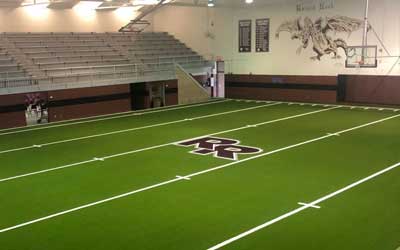 Act Global Installs Indoor Practice Field at Round Rock High School